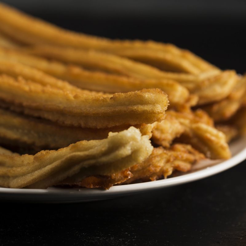 close-up-fried-churros-plate